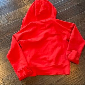 Lululemon orange hoodie.